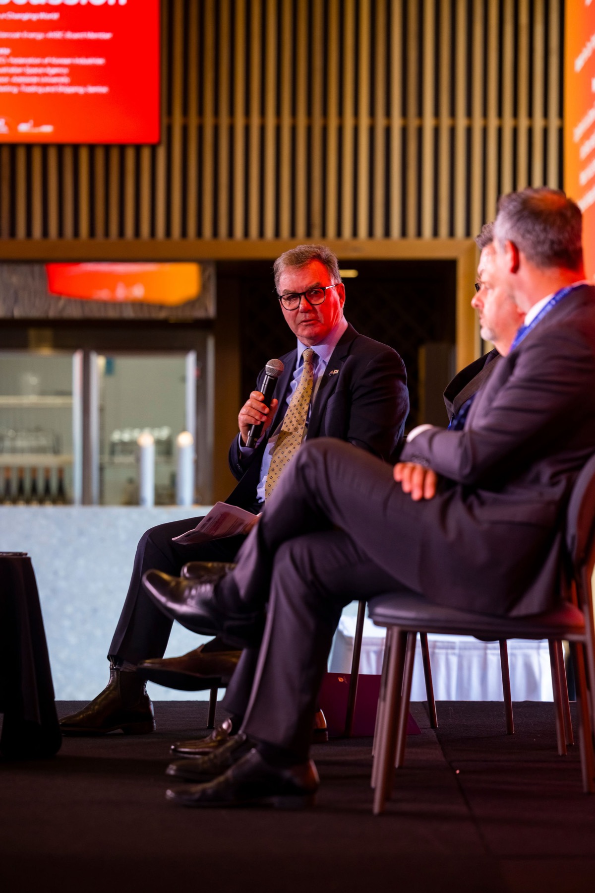 A panellist responding to a question on stage at the 47th AKBC-KABC Joint Meeting, Adelaide